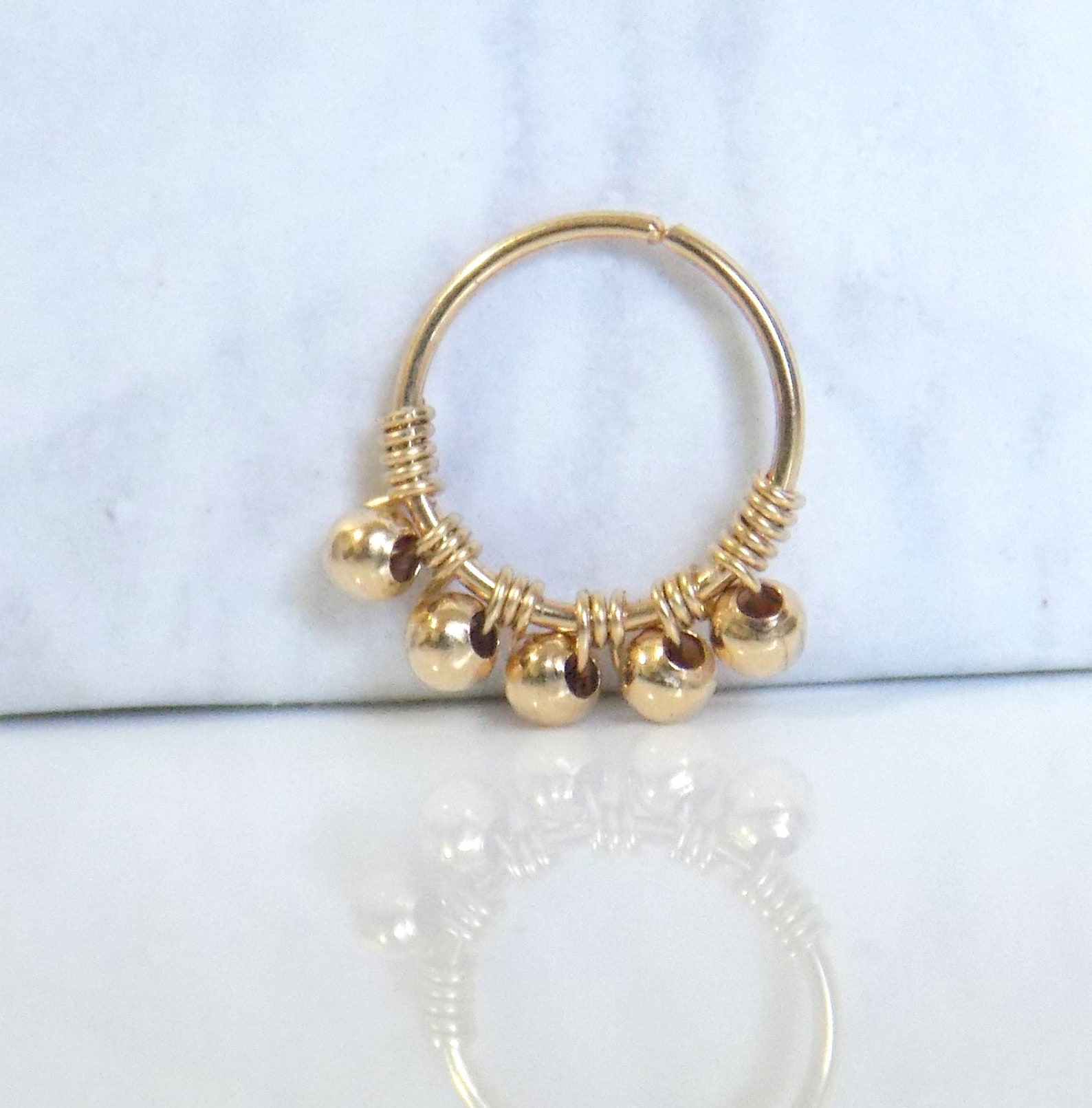 حلقة أنف مرصعة بالخرز مطلية با - مراجعة Body Jewelry Hangers وسعره